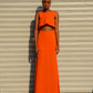 “long orange dress”