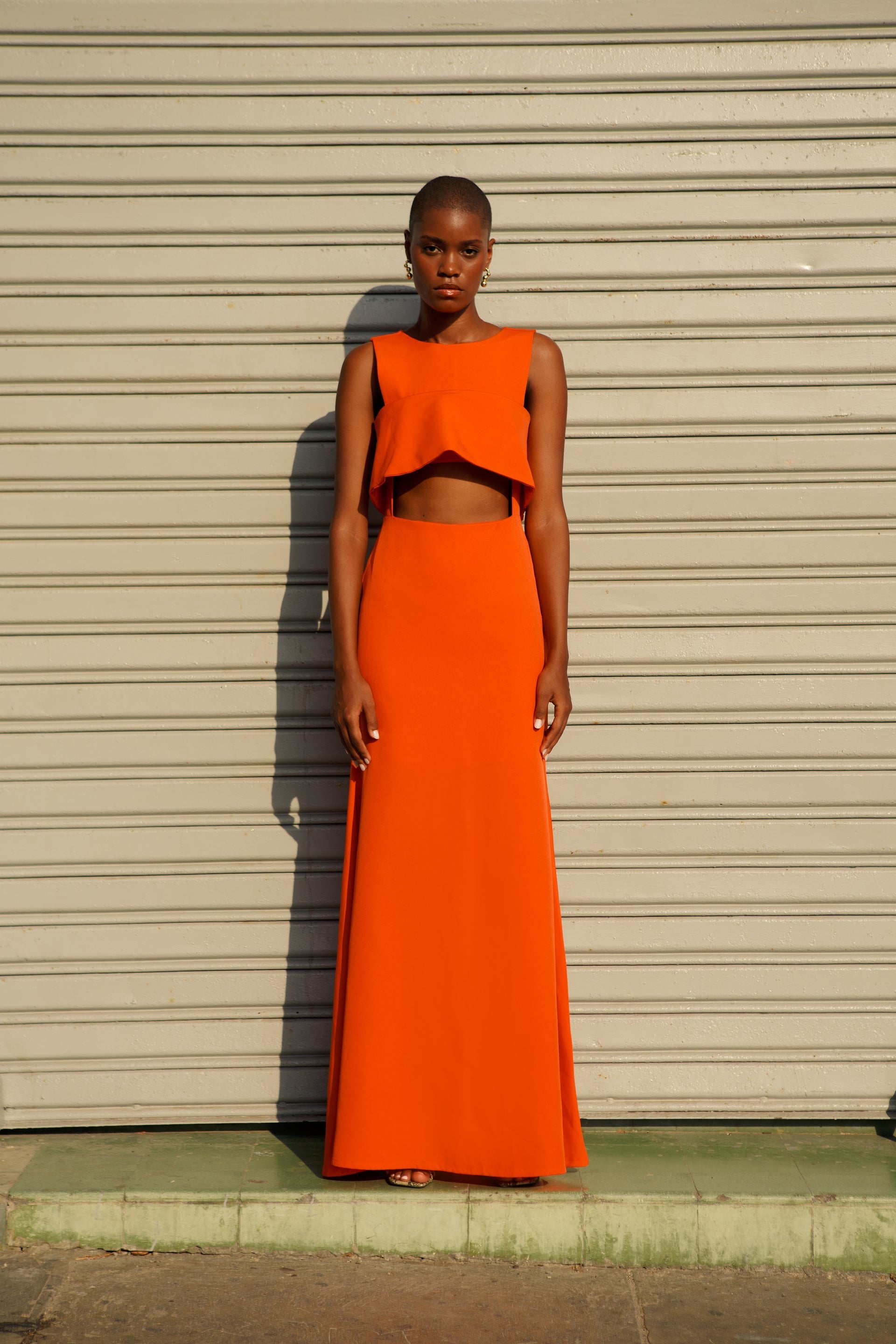 “long orange dress”