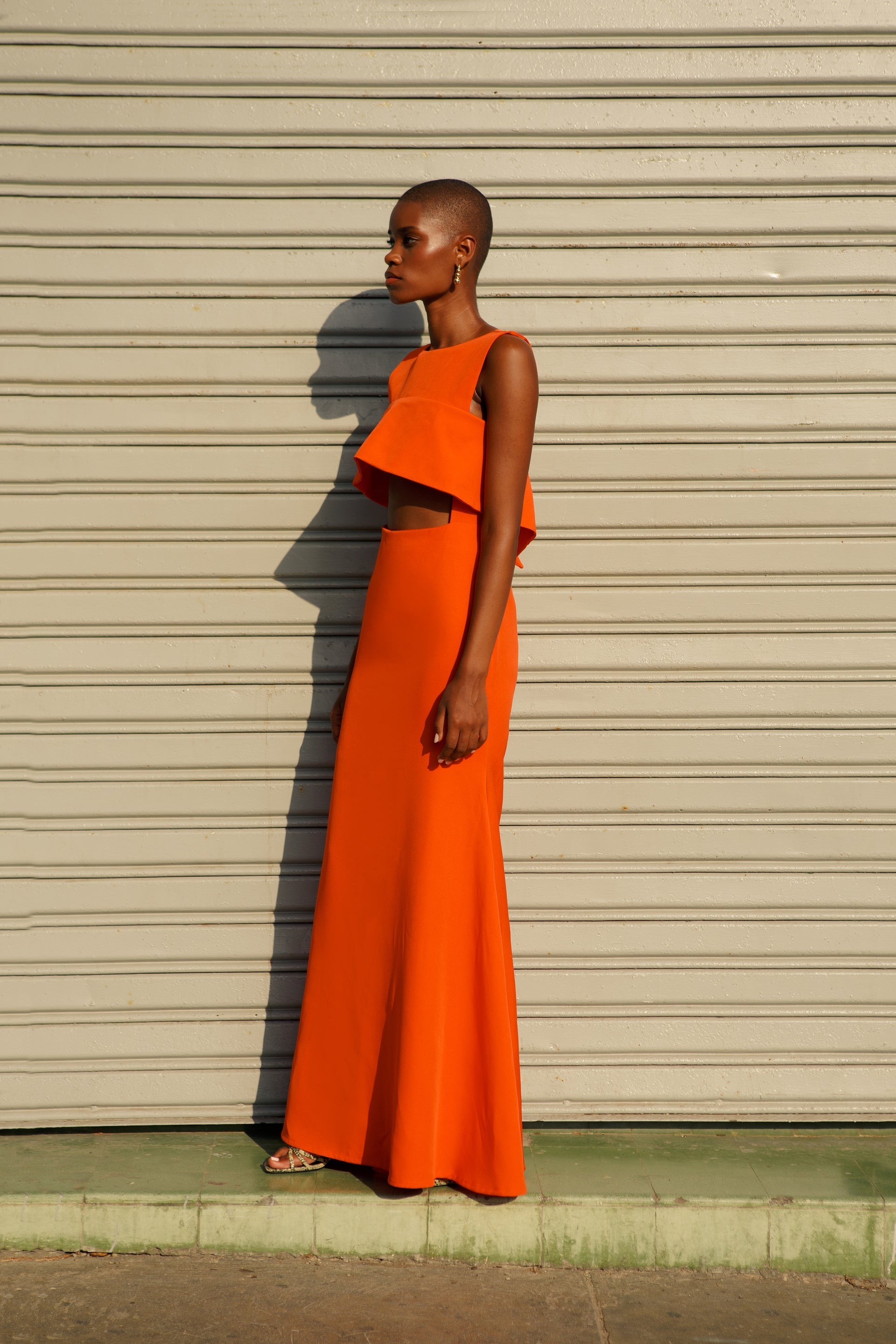 “long orange dress”