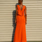 “long orange dress”