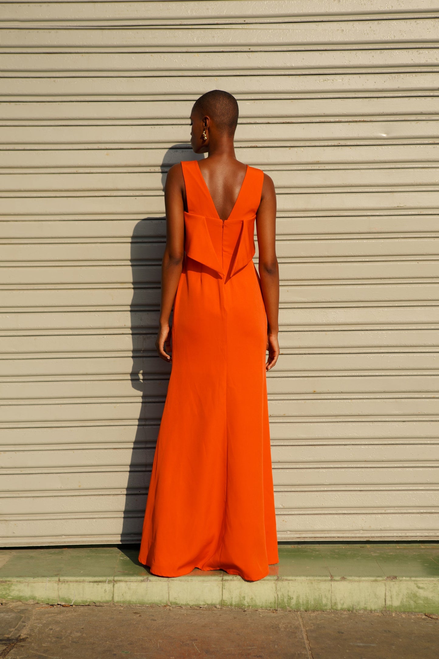 “long orange dress”